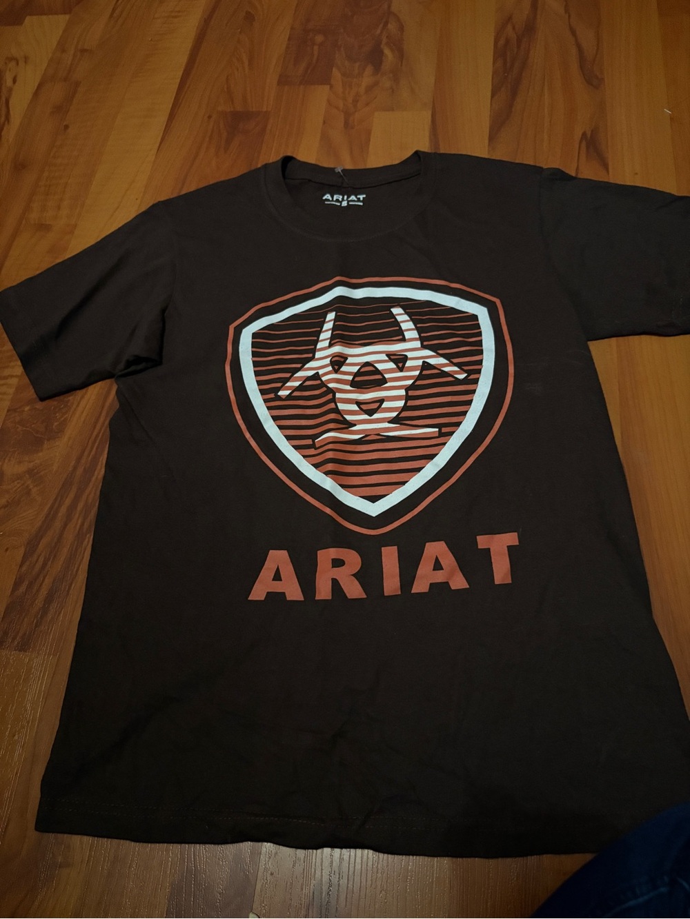 Ariat Black Short-Sleeve Graphic Tee with Rust & Light Blue Shield